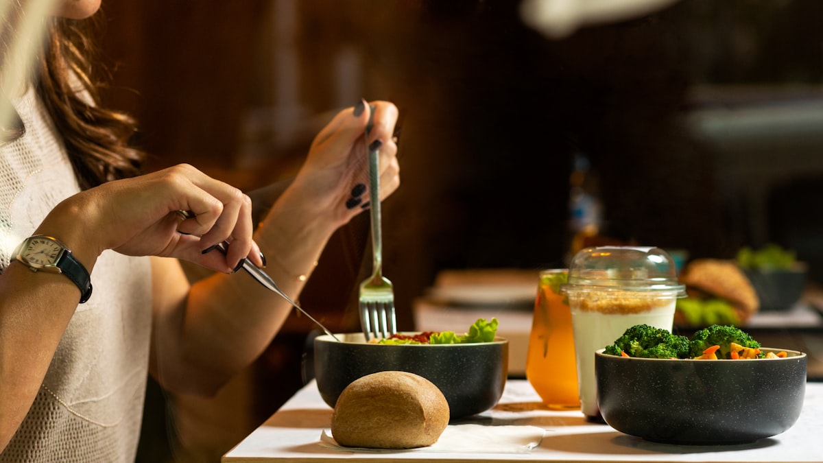 Woman staying hydrated with water and herbal tea